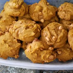 a plastic container filled with peanut butter cookies