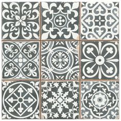 several different types of tiles with white and gray designs on them, all in squares