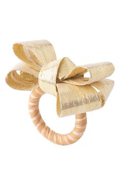 an image of a gold bow ring on a white background for use as a hair accessory