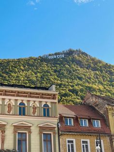 an old building in front of a mountain with the name radsiv on it