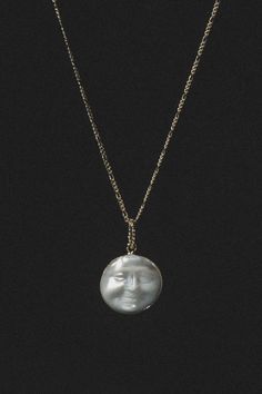 Carefully carved Mother of Pearl moon charm necklace adorned on a Figaro chain. 'Mahina' is the Polynesian word for Moon, which derives from the Hawaiian Moon Goddess, Hina. The moon is deeply associated with the Divine Feminine as it aligns with women's physical and emotional phases throughout their lives. The Moon's light connects us all, our guiding force in the sky above. ✦ Chain measures 20 inches / 18K Gold Overlay ✦ Pendant measures .8 inches round / 18K GP Wiccan Necklace, Gold Moon Necklace, Moon Fashion, Lotus Pendant, The Divine Feminine, Gold Overlay, Figaro Chain, Moon Jewelry, Funky Jewelry