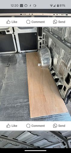 an image of the inside of a truck with wood flooring and other things in it