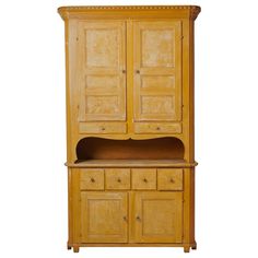 an old wooden cabinet with drawers and cupboards on the bottom, against a white background