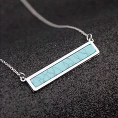 New Silver Plated Faux Turquoise Bar Necklace. Material: Alloy Pendant Size: 1 9/16 Inches X 5/16 Inches (4cm X 8mm) Chain Size: 18 Inches Plus 1 3/4 Inch Extension. Turquoise Wedding Jewelry, Turquoise Bar Necklace, Necklace Styles, Turquoise Bar, Western Turquoise, Convertible Necklace, Bullet Necklace, Claw Necklace, Western Necklaces