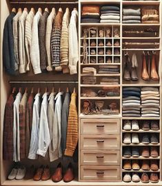 an organized closet with clothes and shoes