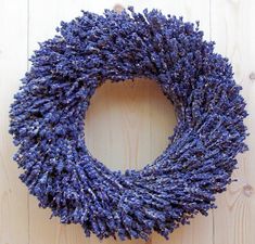 a lavender wreath on a wooden surface