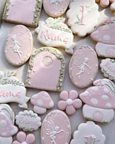 some decorated cookies are sitting on a table