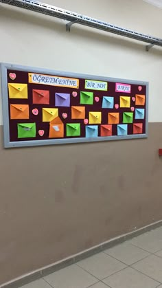 a bulletin board with colorful sticky notes on it