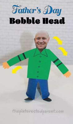 a father's day card with a paper cut out of a man wearing a green shirt and blue pants