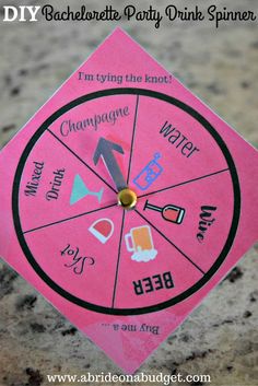 a pink paper wheel with words on it