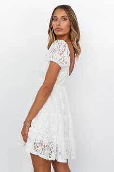 Length from shoulder to hem of size S: 74cm. White lace mini dress. Lined. Cold hand wash only. Model is a standard XS and is wearing size XS. True to size. Lightweight, non-stretchy woven fabric. Elasticated, stretchy, bust. No zipper. Slip-on style. Print placement may vary. Polyester. Dance in hail, rain, or shine in the Dancing In The Rain Dress! With features to die for, this mini has a tiered skirt that twirls in the wind and an option to wear it on and off the shoulder - depending on the Rain Dance, Rain Dress, White Lace Mini Dress, Rain Or Shine, Dancing In The Rain, Print Placement, Look Plus, Lace Mini Dress, Tiered Skirt