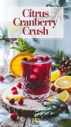 a cranberry crush cocktail in a glass with oranges and pine cones on the side