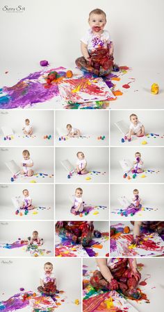 a baby is sitting on the floor covered in paint