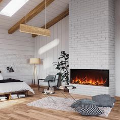 a bedroom with a bed, chair and fireplace in the corner is furnished with white brick walls