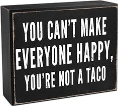 a sign that says you can't make everyone happy, you're not a taco