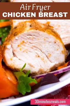 air fryer chicken breast on a white plate with carrots and lettuce