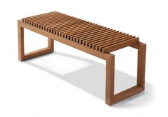 a wooden bench sitting on top of a white floor