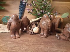 some brown bears are sitting on a table