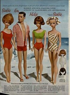 three barbie dolls in swimsuits on the beach