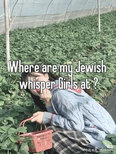 a woman in a greenhouse talking on her cell phone with the words where are my jewish whisper girls at?