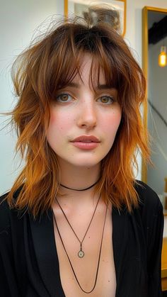 28 Stylish Feathered Haircuts to Feather Your Confidence Middle Part Shag Haircut, Shoulder Shag Haircut, Edgy Haircuts For Round Faces, Layered Haircut With Fringe, Mullet Medium Hair, Alt Haircuts Medium, Trending Haircuts For Women 2024, Shoulder Length Shag Hairstyles