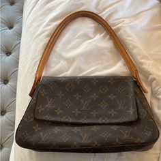 Cute Lil Vintage Louis Vuitton Bag In Almost Perfect Condition. Only Flaws Are The Missing Zipper Pull On The Inside Pocket And A Very Light Stain On The Canvas Inside (See In Video) No Proof Of Authenticity Because It Was A Gift But I Am 100% Sure It’s Authentic. **Added Pic Of Serial # Almost Perfect, Louis Vuitton Shoulder Bag, Vintage Louis Vuitton, The Missing, Vuitton Bag, Light Stain, Authentic Louis Vuitton, Louis Vuitton Bag, Inside Pocket