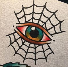 a drawing of an eye with a spider web on it