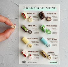 a person is holding up a roll cake menu