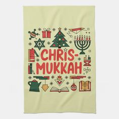 a towel with the words christmas mukkah written in red and green on it