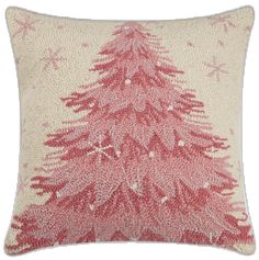 a red christmas tree pillow on a white background