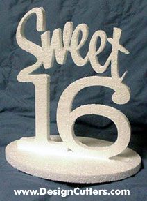 a cake topper with the number sixteen on it's base, sitting on a blue background