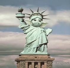 the statue of liberty has its hands in the air