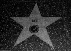 the star on the hollywood walk of fame is shown in this black and white photo