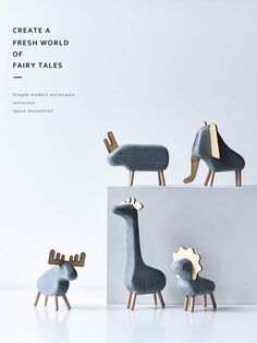 three wooden toy animals sitting on top of a white surface with the words, create a fresh world of fairy tales