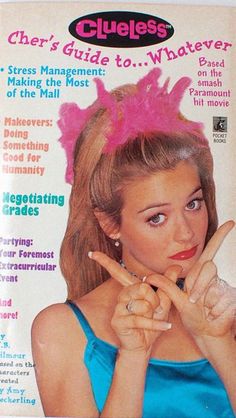 a magazine cover with a woman making the peace sign