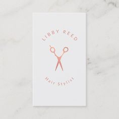 a pair of scissors with the words library reed hair stylist on it's side