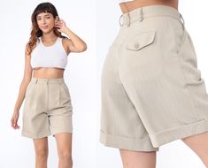 "Vintage 00s shorts in beige with a high waist, front pleats and a cuffed hem. Three pocket design. Please see measurements and condition below. Every garment we sell is authentic vintage! You will receive the exact item photographed. Condition: Very good vintage. Best fits women's: 28 Tag: intenti Material:  76 Polyester 24 viscose MEASUREMENTS Taken from seam to seam while the garment is lying flat. Double the armpit, waist, and hips For reference, model is 5'9\" and measures 35-27.5-39. Waist Beige Trouser, 1950s Shorts, High Waisted Mom Shorts, Kawaii Sweater, White Babydoll Dress, Cream Mini Dress, Trouser Shorts, Culotte Shorts, Shorts Y2k