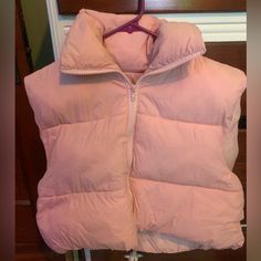 I Accidently Ordered 2 Of The Same Puffer Vests. The One In The Photo Is Mine But The One I Am Selling Is Brand New In The Plastic And Everything. Says Xl But Fits Like A L Or Even A M. For Reference I Am 5’5 And 155lbs So It Isn’t Snug But Just The Right Fit Pink Puffer Vest, Puffer Vests, Cropped Pink, Puff Vest, Pink Vest, Puffer Vest, Pink Ladies, The One, Puffer