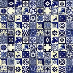 a blue and white tile pattern with different designs on the tiles, including an animal