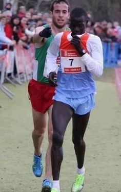 two men are running in a race