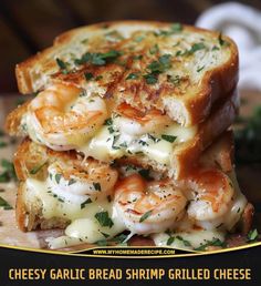 a grilled cheese sandwich with shrimp is stacked on top of each other and topped with parsley