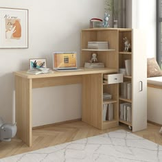 a computer desk with books and pictures on the shelf next to it in front of a window