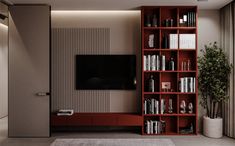 a living room filled with furniture and a flat screen tv mounted on a wall next to a book shelf