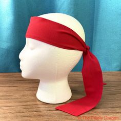 Designed to resemble the headband worn by a Mr. Gill, this listing is for a single 2.25" wide red headband with tapered ends. Add a cat shirt to this headband and be your own stock-trading raging kitty! SIZE: about 44 inches long,  2.25 inches wide. COLOR: Red Made from woven cotton, which means no stretching out and a secure knot when tied. The finishing touch to your rogue stock trader costume. Also great for any pirate, karate, ninja, or anime attire. 100% Cotton, Machine wash cold, tumble dr Ninja Birthday Party Favors, Pirate Headband, Secure Knot, Spider Headband, Pirate Costume Accessories, Snowman Dress, Ninja Birthday Parties, Daisy Headband, Ninja Birthday