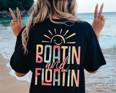 the back of a woman's shirt that says boatin and floatin on it