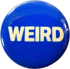 a blue button with the word weird written in white on it's front side