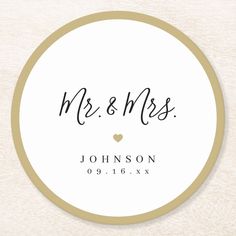 a round wedding coaster with the word mr and mrs printed in black ink on it