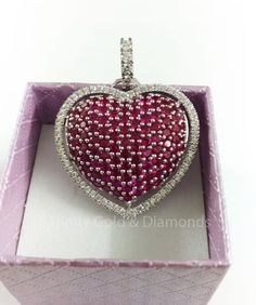 Pave Ruby And Diamond Heart Pendant Necklace, Ruby Heart Pendant, Gemstone Heart Pendant, Birthstone Heart Pendant, Big ruby Heart Pendant Main stone : Ruby Gemstone Creation : Lab Created Diamonds *Secondary Stones: Moissanite Diamond (MOISSANITE PASSES DIAMOND Tester Metal Purity: 925 parts per 1000 Cut: Very Good Metal: Sterling Silver ** PRODUCT CARE ** >> Keep your jewels safe in our box. >> When storing jewelry make sure it doesn't rub against other jewelry >> Though our jewelry doesn't turn black it is recommended to keep it away from water chemicals, soap, etc. ** SHIPPING ** We ship all time via standard post, It takes around3-5 working days to deliver an item. M O R E ∙ F R O M ∙ U S https://www.etsy.com/in-en/shop/trinitygolddiamonds?ref=seller-platform-mcnav Customization is al Heart-shaped Cubic Zirconia Jewelry For Valentine's Day, Cubic Zirconia Heart Necklace With Gemstone For Valentine's Day, Heart Necklace With Cubic Zirconia For Valentine's Day, Valentine's Day Heart Necklace With Cubic Zirconia Gemstone, Cubic Zirconia Heart Necklace With Gemstone, Heart-shaped Gemstone Heart Necklace For Weddings, Heart-shaped Gemstone Necklace For Wedding, Diamond Heart Necklace With Gemstone, Heart-shaped Diamond Necklace With Gemstone