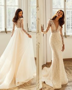 a woman in a wedding dress standing next to a mirror and looking at her reflection