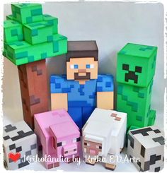 some paper toys that are made to look like minecraft characters